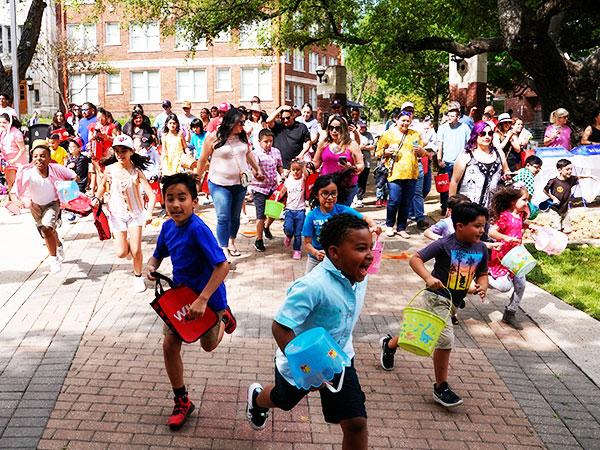 Children running for Easter eggs